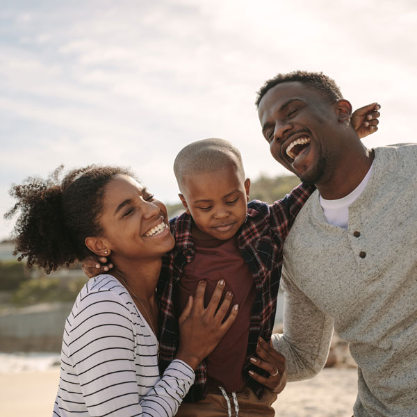 The couples lifting child with happy smile at Flagstaff, AZ