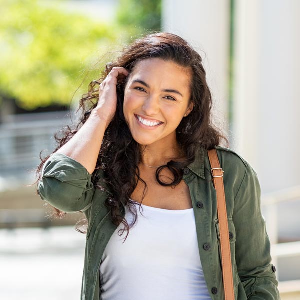 The girl posing with happy bright smile at Flagstaff, AZ