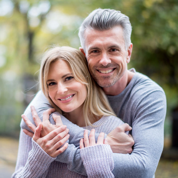 mature adult couple smiling